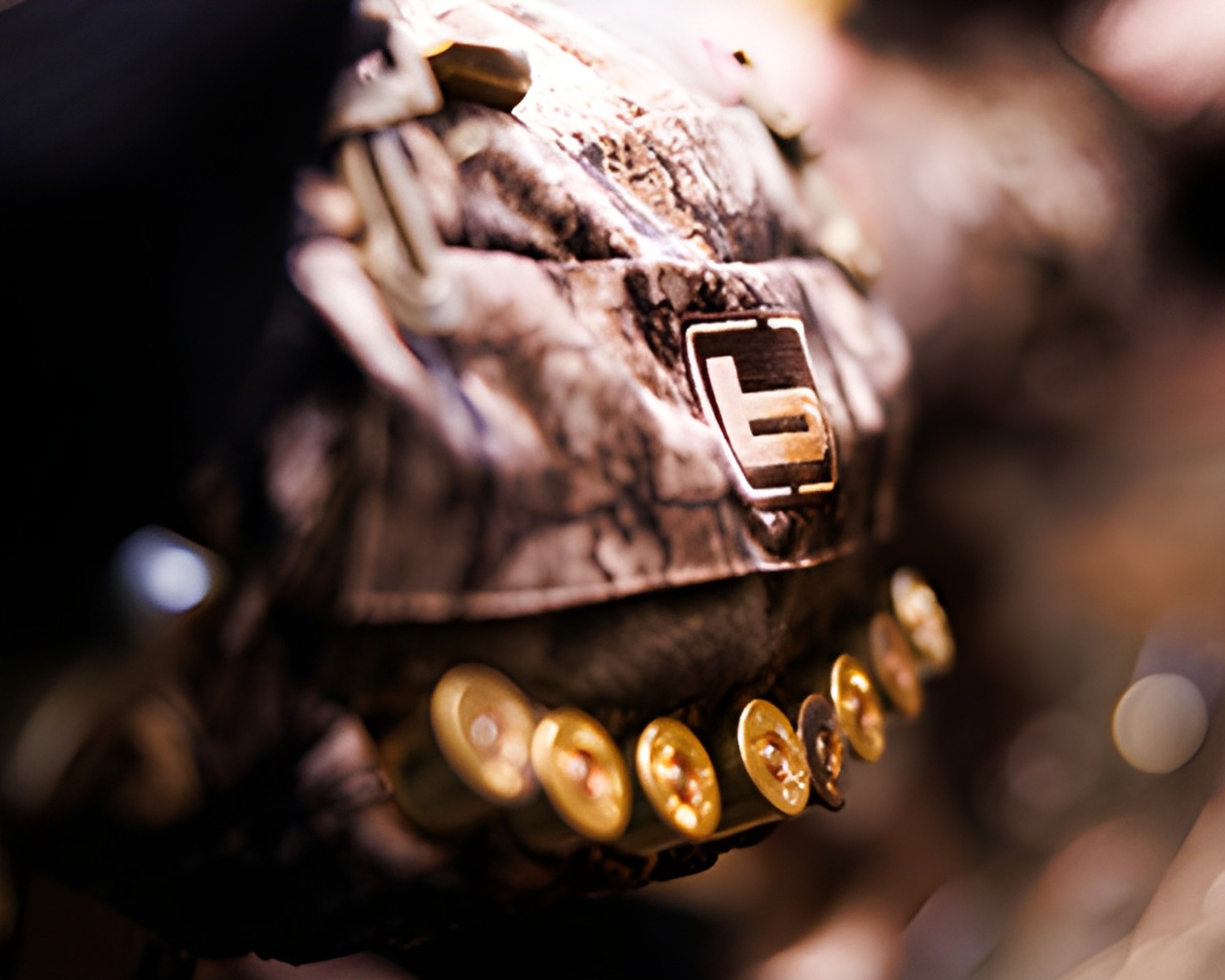 Close-up of a camo ammunition pouch with shotgun shells, representing gear used on Darby's Warrior Support outings
